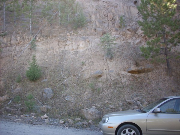 La Grulla
        andesite under a cliff of Bandelier Tuff